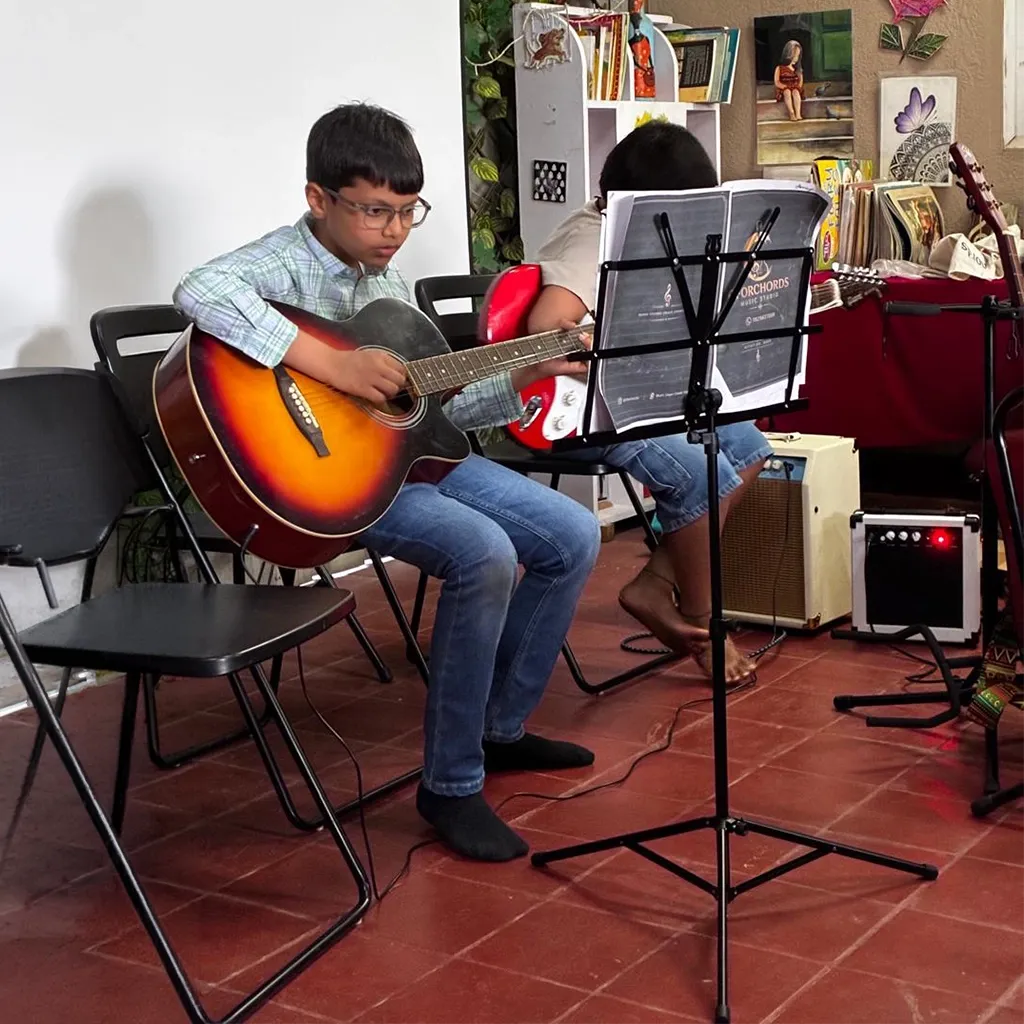 A guitar lesson up close
