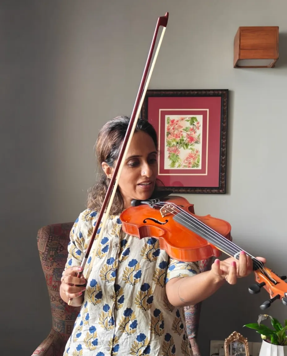 Violin lesson at a student's home in Bengaluru